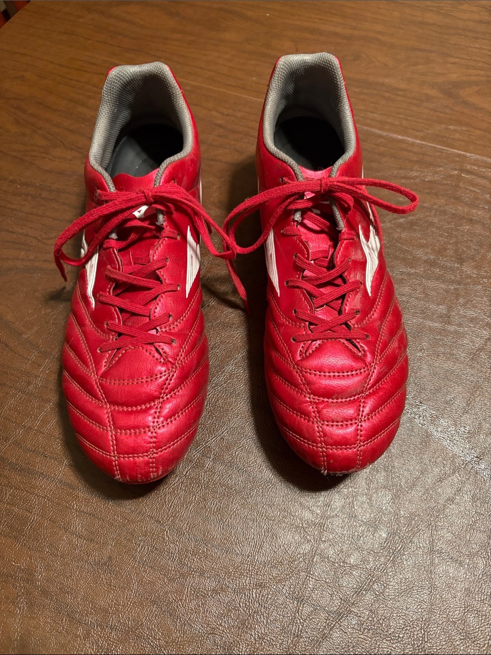 Mizuno’s red soccer cleats